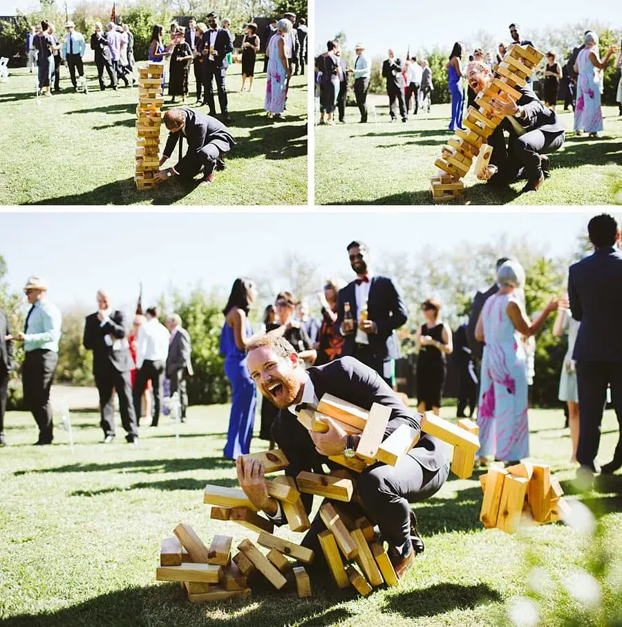 Three photographs of guests playing a giant wooden block game as the tower falls.