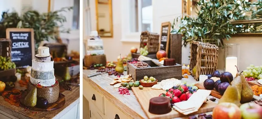 Two photographs of stacked cheese wheels and a buffet of fruit and cheeses.