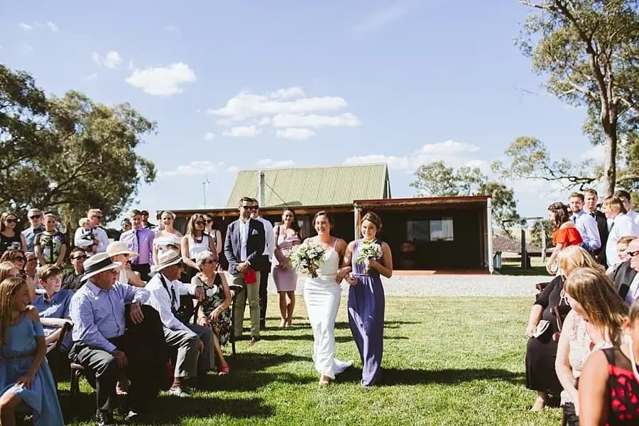 Bride walking down the aisle with her escort