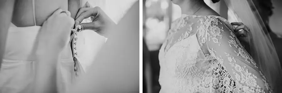 Two black-and-white close-ups of hands fastening the bride's wedding dress.