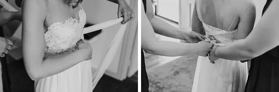 Two black-and-white details of women fastening the bride's strapless wedding dress.