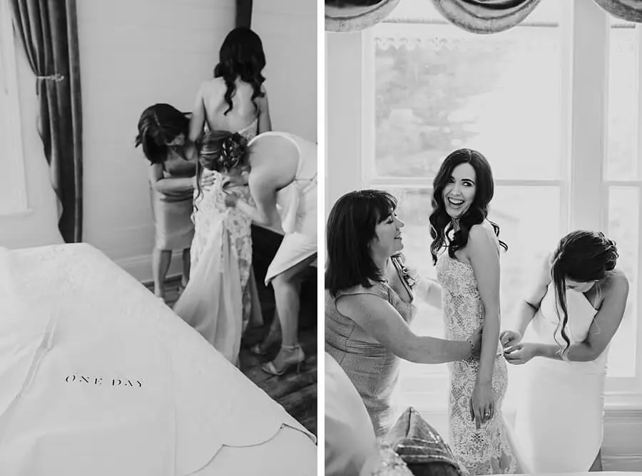 Two black-and-white photographs of women helping the bride put on her lace wedding dress.