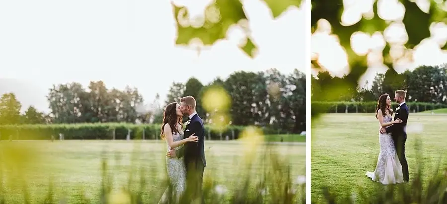 Two portraits of the couple embracing on a green lawn through leafy branches.