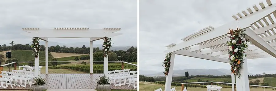 Two photographs of a white ceremony pergola decorated with flowers overlooking vineyard hills.