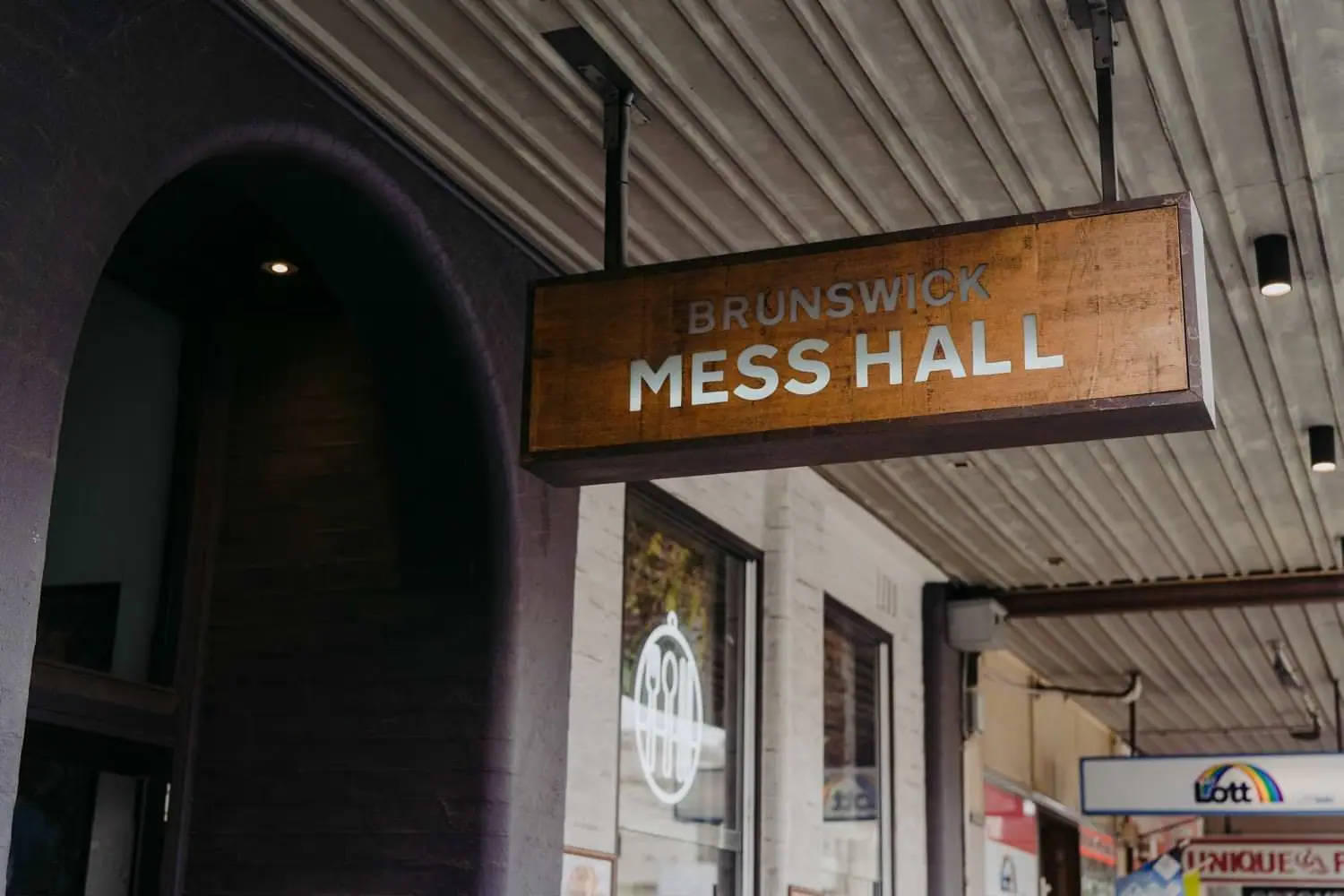 Brunswick Mess Hall sign hanging above the street entrance