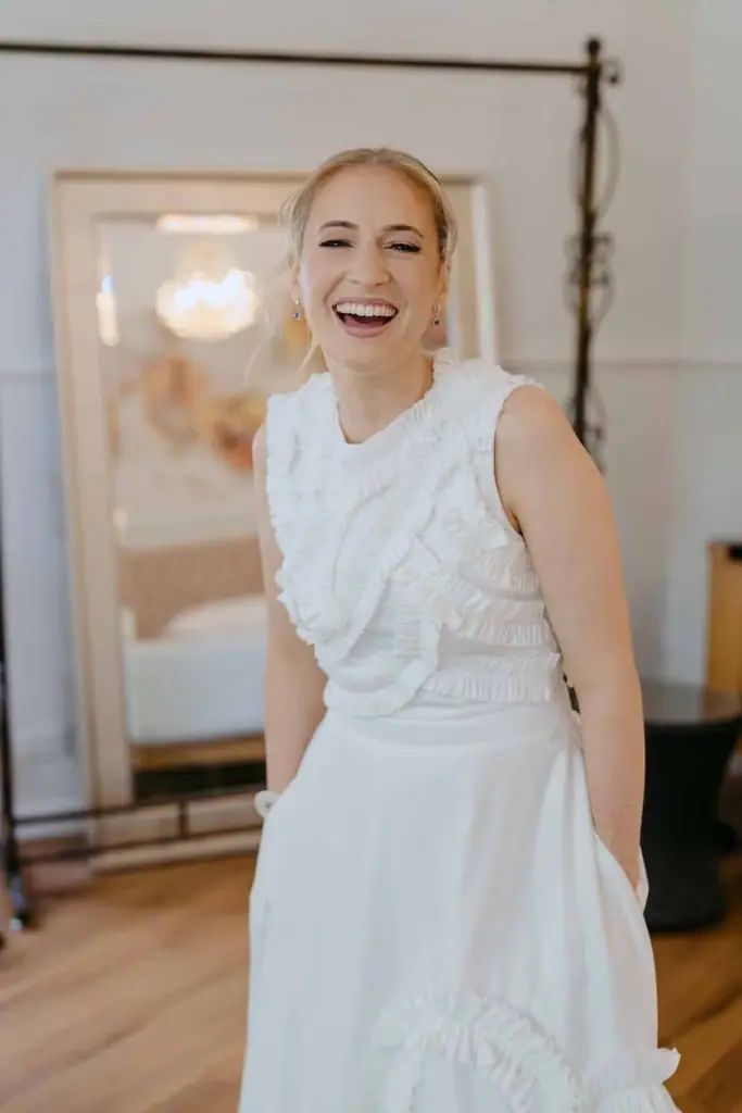 Bride smiling in her wedding dress