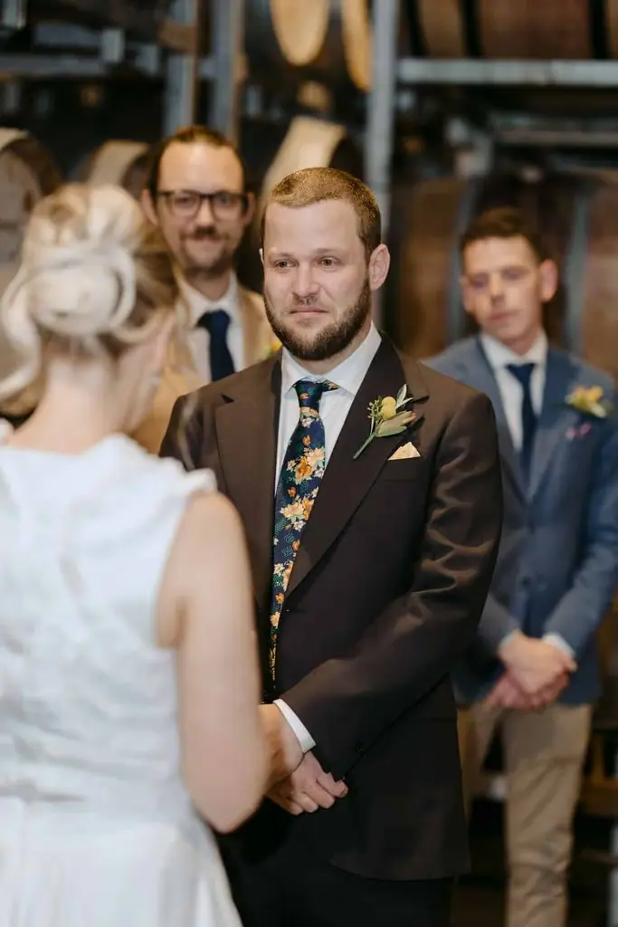 Groom reading his vows to the bride