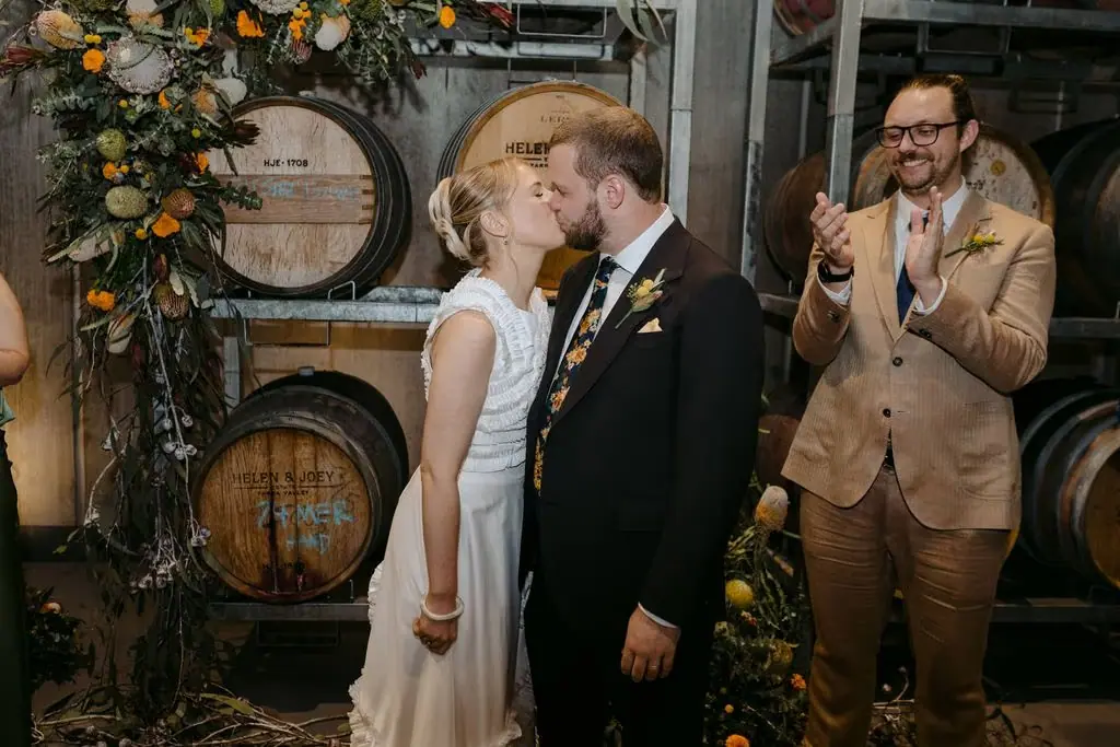 Couple kissing at the end of their ceremony