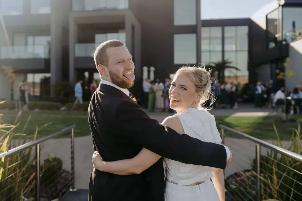 Couple embracing in the afternoon sunlight