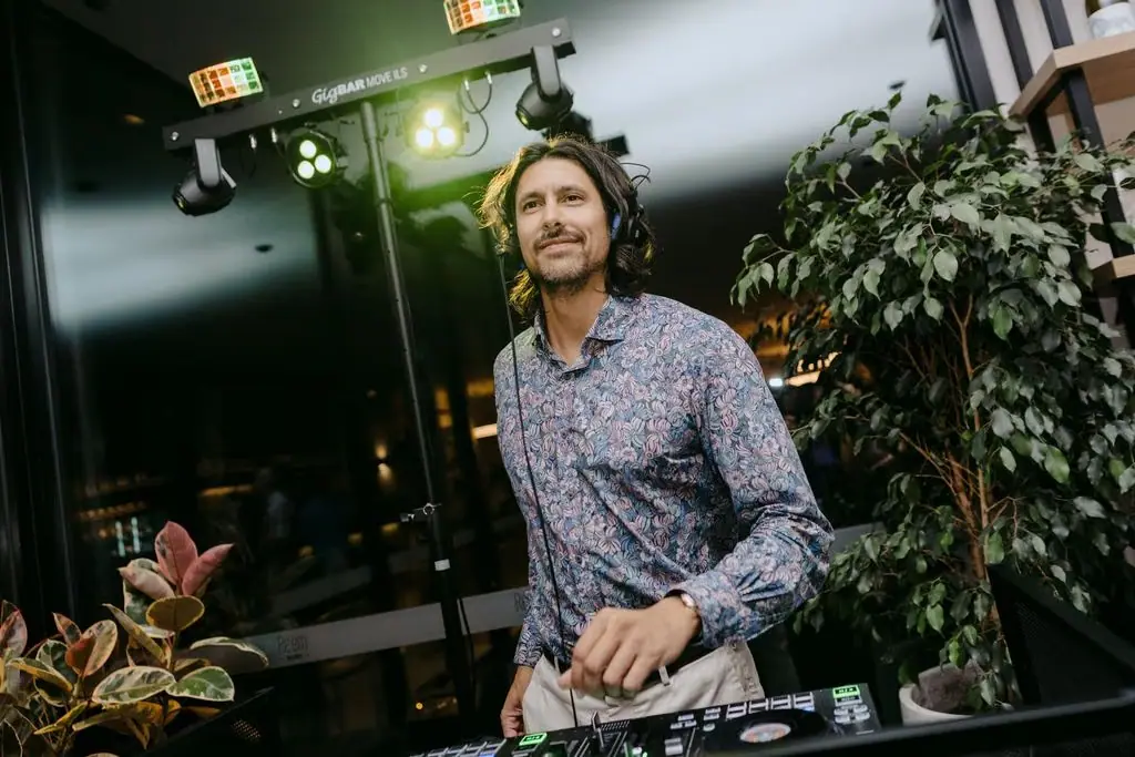 DJ working at the mixing desk