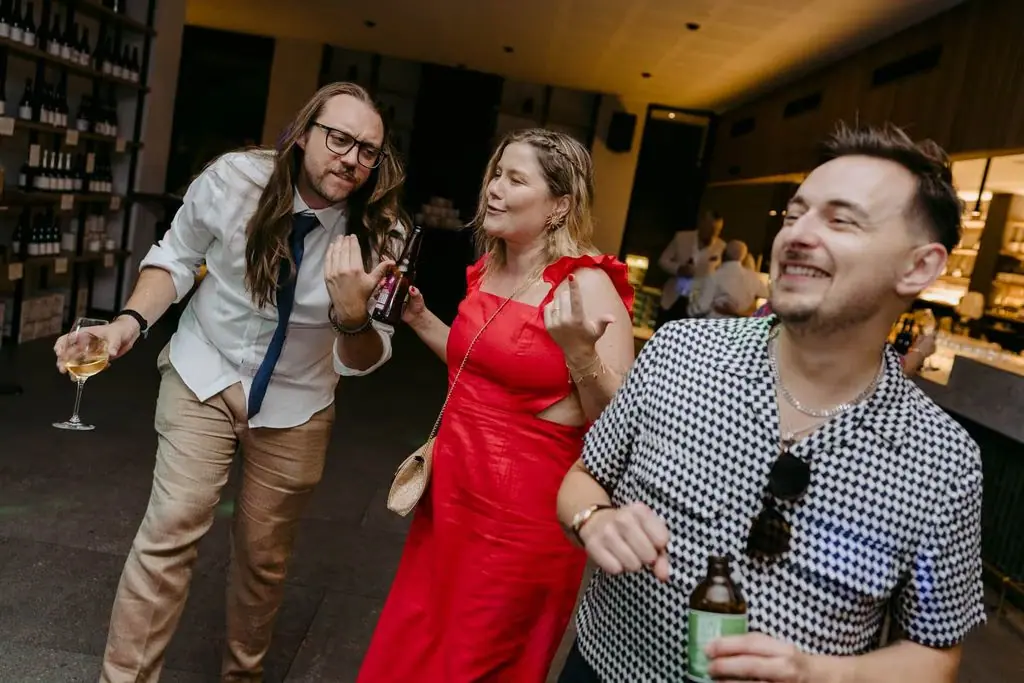 Guests dancing together indoors