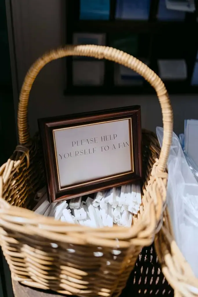 Basket holding ceremony items and a framed sign