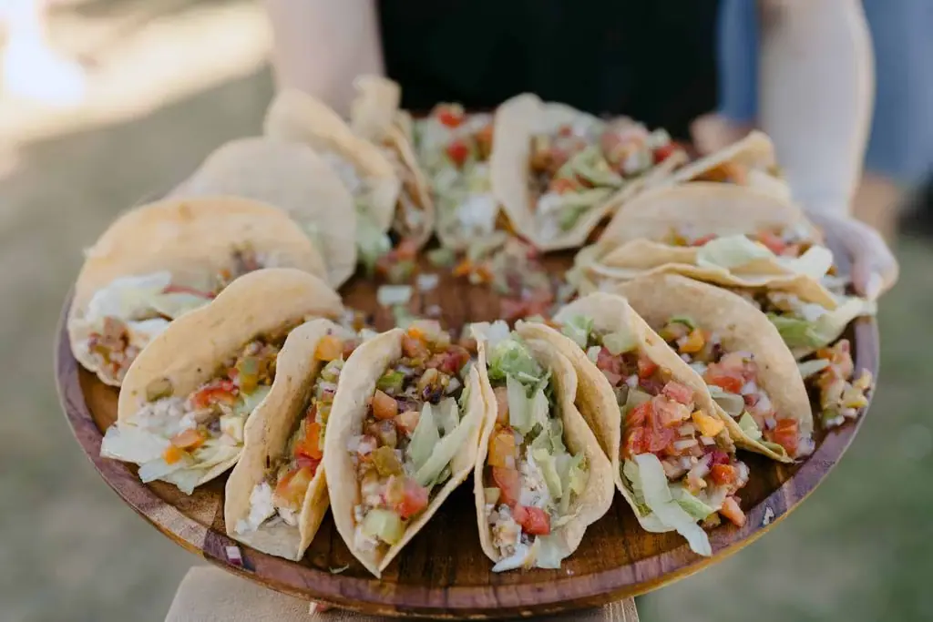 A platter of filled tacos served at the reception