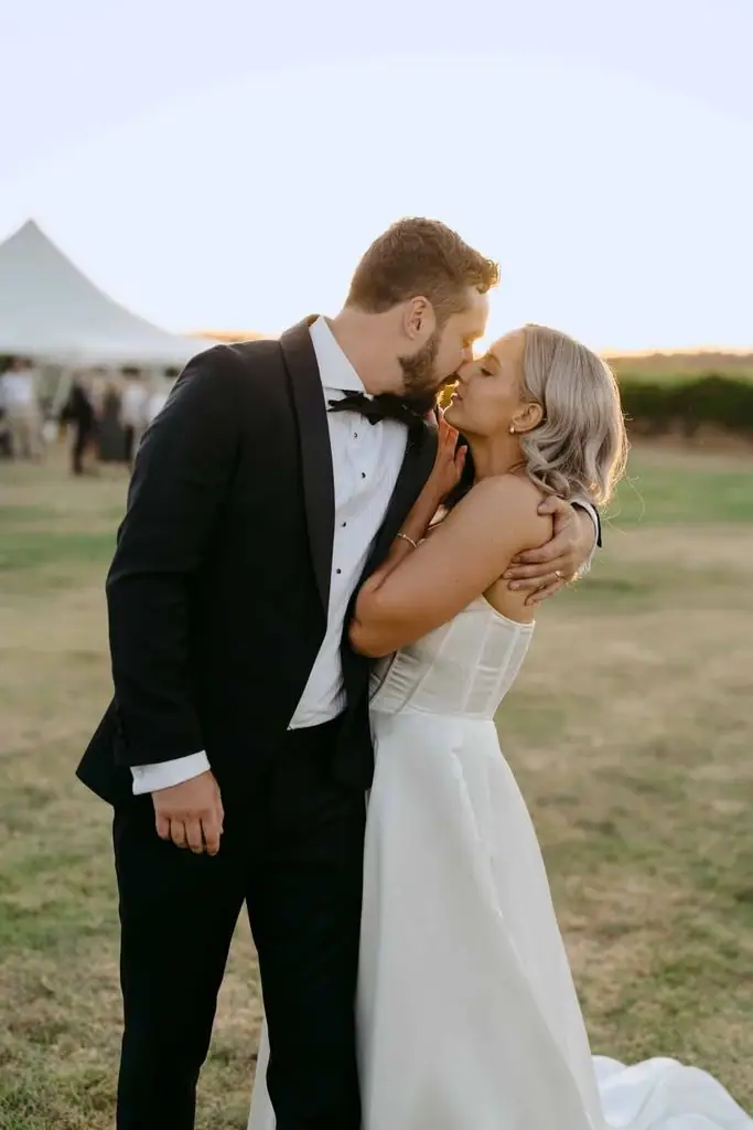 Couple touching foreheads during a sunset portrait
